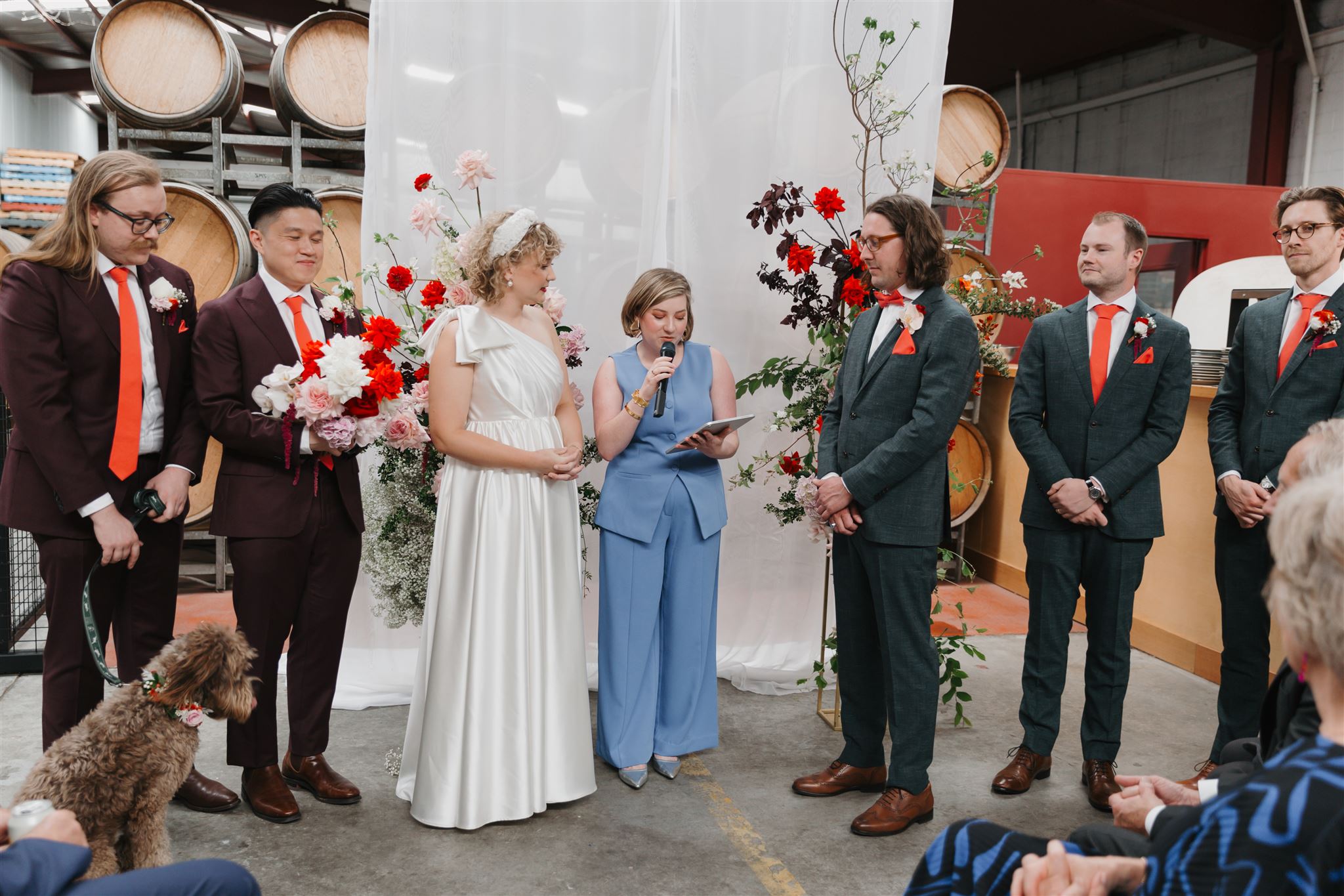 Harriett marrying couple, surrounded by bride, groom and wedding party
